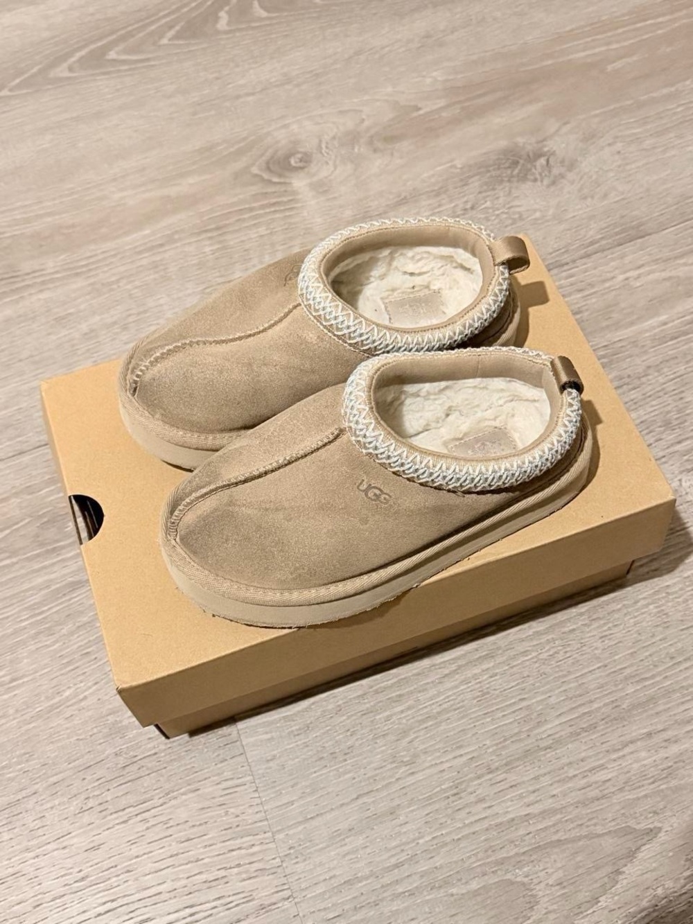 UGG Kids Slip-On Cozy Shearling Lined Slippers in Chestnut Tan